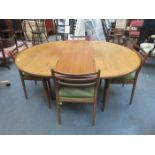 G PLAN TEAK EXTENDING DINING TABLE WITH FOUR CHAIRS