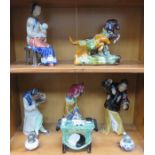 PARCEL OF ORIENTAL GLAZED CERAMIC FIGURES PLUS TWO DELFT STYLE PEPPERETTES