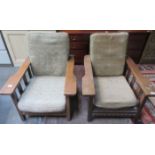 PAIR OF OAK RECLINING ARMCHAIRS