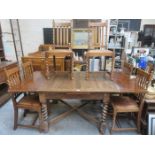 OAK BARLEY TWIST DRAW LEAF DINING TABLE AND SIX CHAIRS