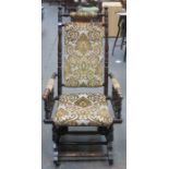 19th CENTURY STAINED BEECH UPHOLSTERED AMERICAN ROCKING CHAIR