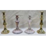 PAIR OF SILVER PLATED CANDLESTICKS AND BRASS CANDLESTICKS