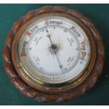 CARVED WOODEN CASED CIRCULAR BAROMETER