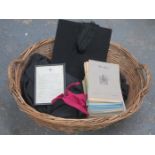 WICKER BASKET CONTAINING VINTAGE GRADUATION GOWN,