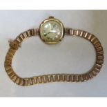 9ct GOLD LADIES WRISTWATCH ON 9ct GOLD STRAP