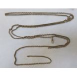 UNHALLMARKED YELLOW METAL LONG WATCH CHAIN,