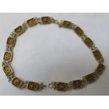 UNHALLMARKED YELLOW METAL EGYPTIAN STYLE NECKLACE, APPROXIMATELY 34.