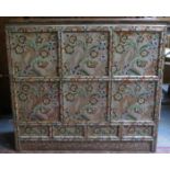 19th CENTURY FLORAL DECORATED TIBETAN STORAGE CABINET FITTED WITH SIX DOORS AND FOUR SMALL CUPBOARD