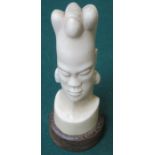 CARVED AFRICAN STYLE IVORY BUST ON WOODEN STAND APPROX.