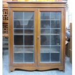 OAK TWO DOOR LEADED GLASS BOOKCASE