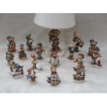 COLLECTION OF VARIOUS GEOBELS UNGLAZED FIGURES BY MJ HUMMELL PLUS TABLE LAMP (SOME AT FAULT)