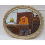 OVAL GILT FRAMED WALL MIRROR,