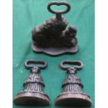 THREE CAST IRON DOOR STOPS