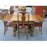1920s/30s OAK DRAW LEAF DINING TABLE TOGETHER WITH A SET OF FOUR QUEEN ANNE STYLE OAK HIGH BACK