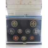 NINE CASED ROYAL MINT PROOF COIN SETS.