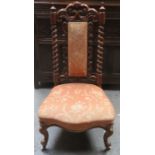 VICTORIAN WALNUT BARLEY TWIST AND PIERCEWORK DECORATED LOW SEATED CHAIR.