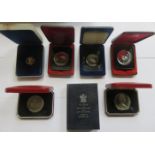 THREE CANADIAN CASED PROOF COINS AND FOUR POBJOY MINT PROOF COINS