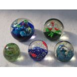 FIVE VARIOUS AQUARIUM STYLE GLASS PAPERWEIGHTS