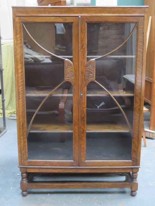 CARVED FRONTED OAK ASTRAGAL GLAZED TWO DOOR BOOKCASE