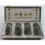 CASED SET OF FOUR HANDPAINTED GLASS SNUFF BOTTLES.