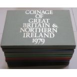 TWELVE VARIOUS CASED MOSTLY ROYAL MINT PROOF COIN SETS.