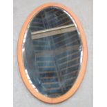 EDWARDIAN MAHOGANY INLAID AND BEVELLED OVAL WALL MIRROR,