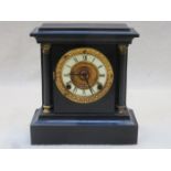 DECORATIVE BLACK SLATE CLOCK WITH ENAMELLED AND GILT DIAL,