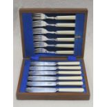 MAHOGANY CASED SET OF SIX BONE HANDLED FISH KNIVES AND FORKS