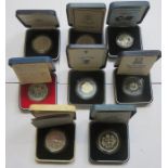 EIGHT VARIOUS CASED SILVER PROOF COINS.