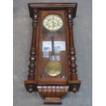 19th CENTURY MAHOGANY AND GLAZED VIENNA WALL CLOCK WITH CIRCULAR ENAMELLED DIAL