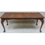 20tH CENTURY WALNUT VENEERED SHAPED TOPPED COFFEE TABLE