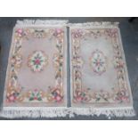 PAIR OF SMALL CHINESE FIRESIDE RUGS BY GH FRITH,