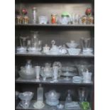 COLLECTION OF GLASSWARE INCLUDING GLASSES, CANDLESTICKS, CAKE STAND AND BOWLS, ETC.