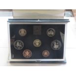 NINE CASED ROYAL MINT PROOF COIN SETS.