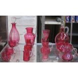 MIXED LOT OF CRANBERRY COLOURED GLASSWARE INCLUDING DECANTERS AND JUGS, ETC.