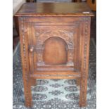 CARVED FRONTED OAK POT CUPBOARD.