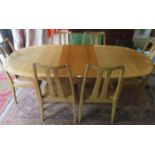 NATHAN FURNITURE & CO EXTENDING TABLE AND SIX CHAIRS