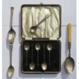 CASED SET OF FIVE COFFEE BEAN SPOONS AND OTHER SILVER SPOONS.