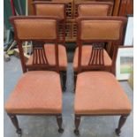 SET OF FOUR CARVED AND PIERCEWORK DECORATED UPHOLSTERED CHAIRS