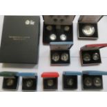 TEN VARIOUS CASED SILVER AND OTHER PROOF COINS SETS.