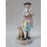 ROYAL COPENHAGEN HANDPAINTED AND GILDED CERAMIC FIGURE GROUP DEPICTING A GENT PLAYING THE FLUTE