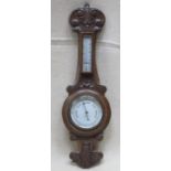 CARVED OAK CASED ANEROID BAROMETER