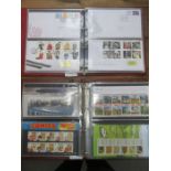 TWO ALBUMS CONTAINING FIRST DAY COVERS AND PROOF STAMP SETS