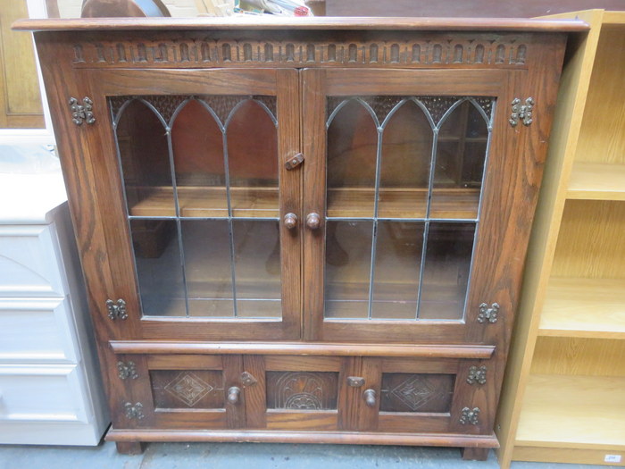 20th CENTURY PRIORY STYLE OAK TWO DOOR LEADED GLASS BOOKCASE WITH TWO DOORS BELOW