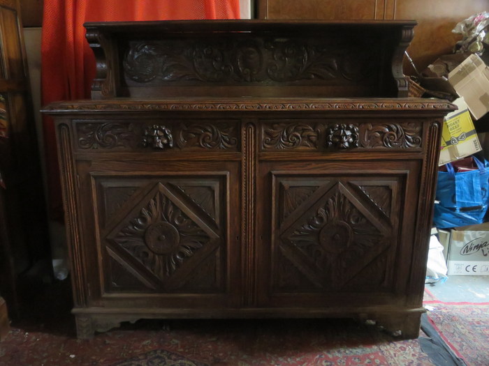 HEAVILY CARVED OAK SIDEBOARD