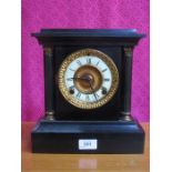 DECORATIVE BLACK SLATE CLOCK WITH ENAMELLED AND GILT DIAL,