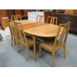 NATHAN FURNITURE & CO EXTENDING TABLE AND SIX CHAIRS