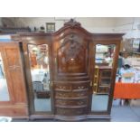 VICTORIAN CARVED AND BOW FRONTED MAHOGANY TRIPLE WARDROBE