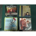 COLLECTION OF SINGLES INCLUDING PAUL McCARTNEY AND GEORGE HARRISON