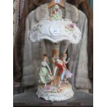 VEB PORZELLAN MANUFAKTUR PLAUE HANDPAINTED AND RELIEF DECORATED FIGURE FORM TABLE LAMP WITH SHADE,